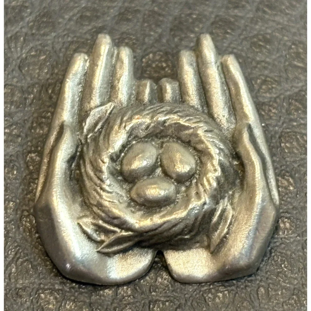 Vintage 1989 GUYOT Pewter Hands Holding Birds Nest With Eggs Brooch Pin